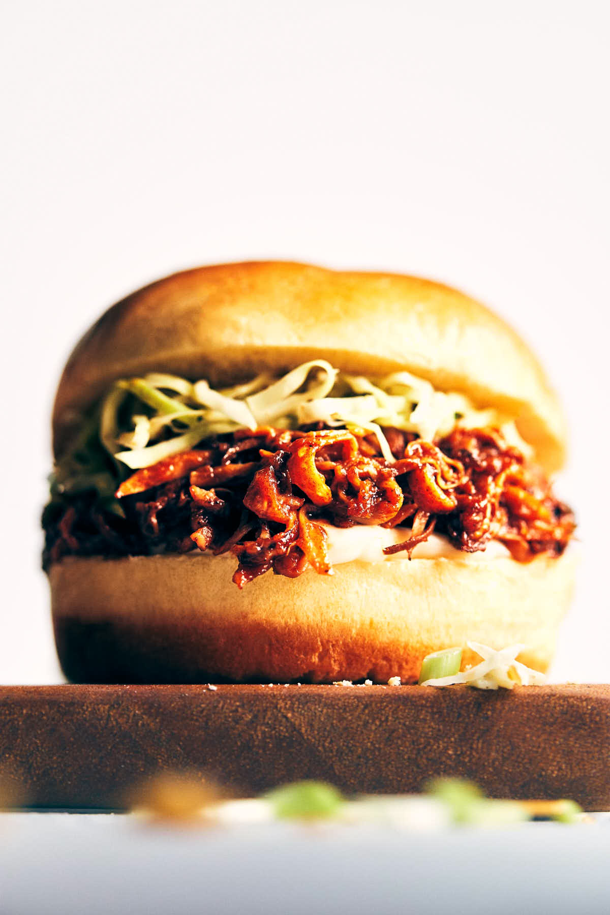 Barbecue pulled mushroom sandwich with a green cabbage and apple slaw