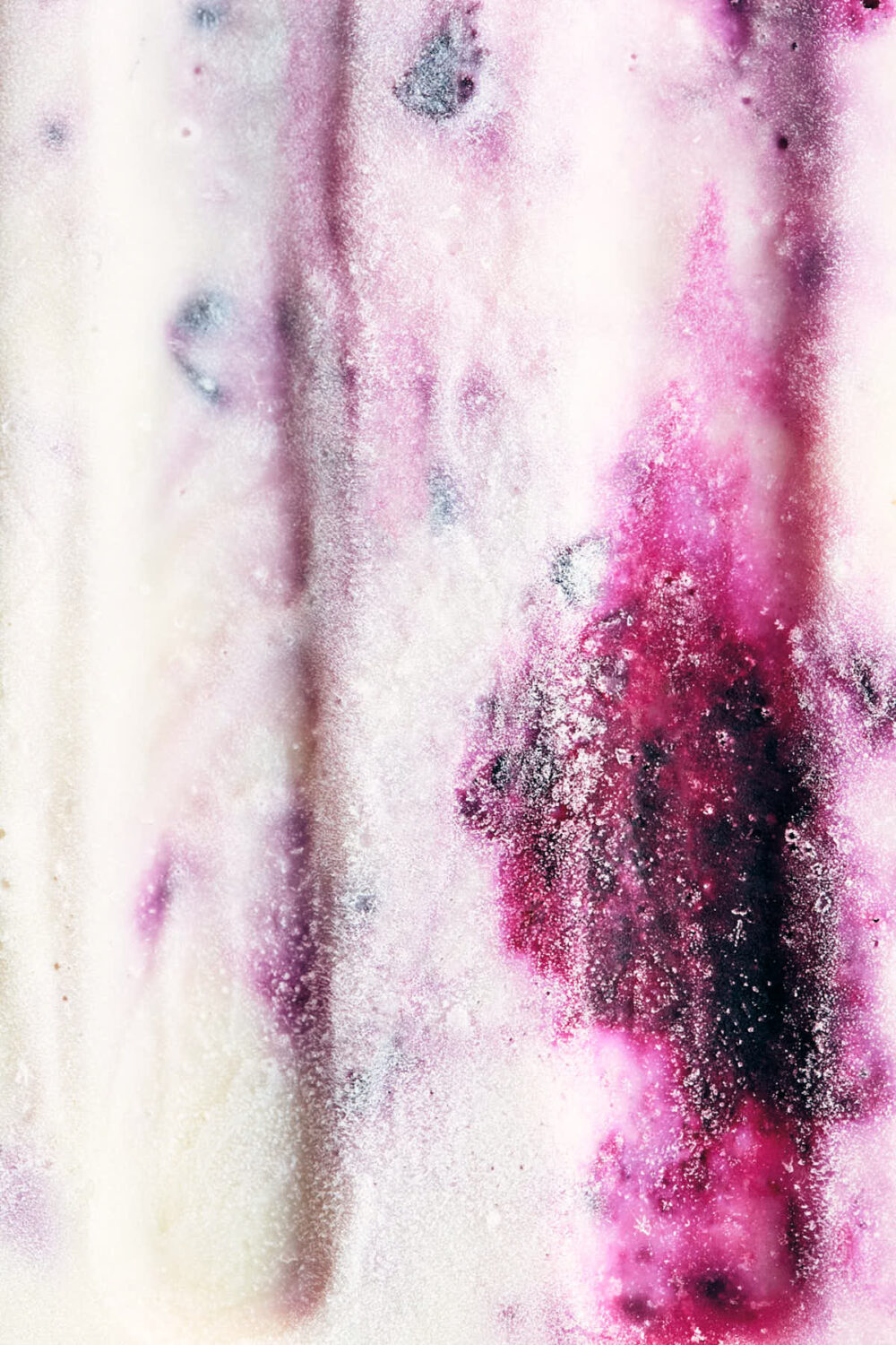 Close up texture of finished blackerry cheesecake popsicle