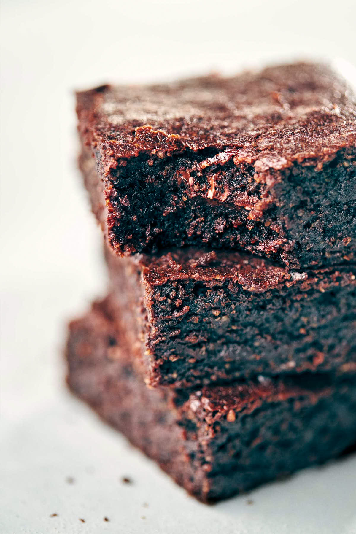 Close up of stacked chocolate fudge brownies