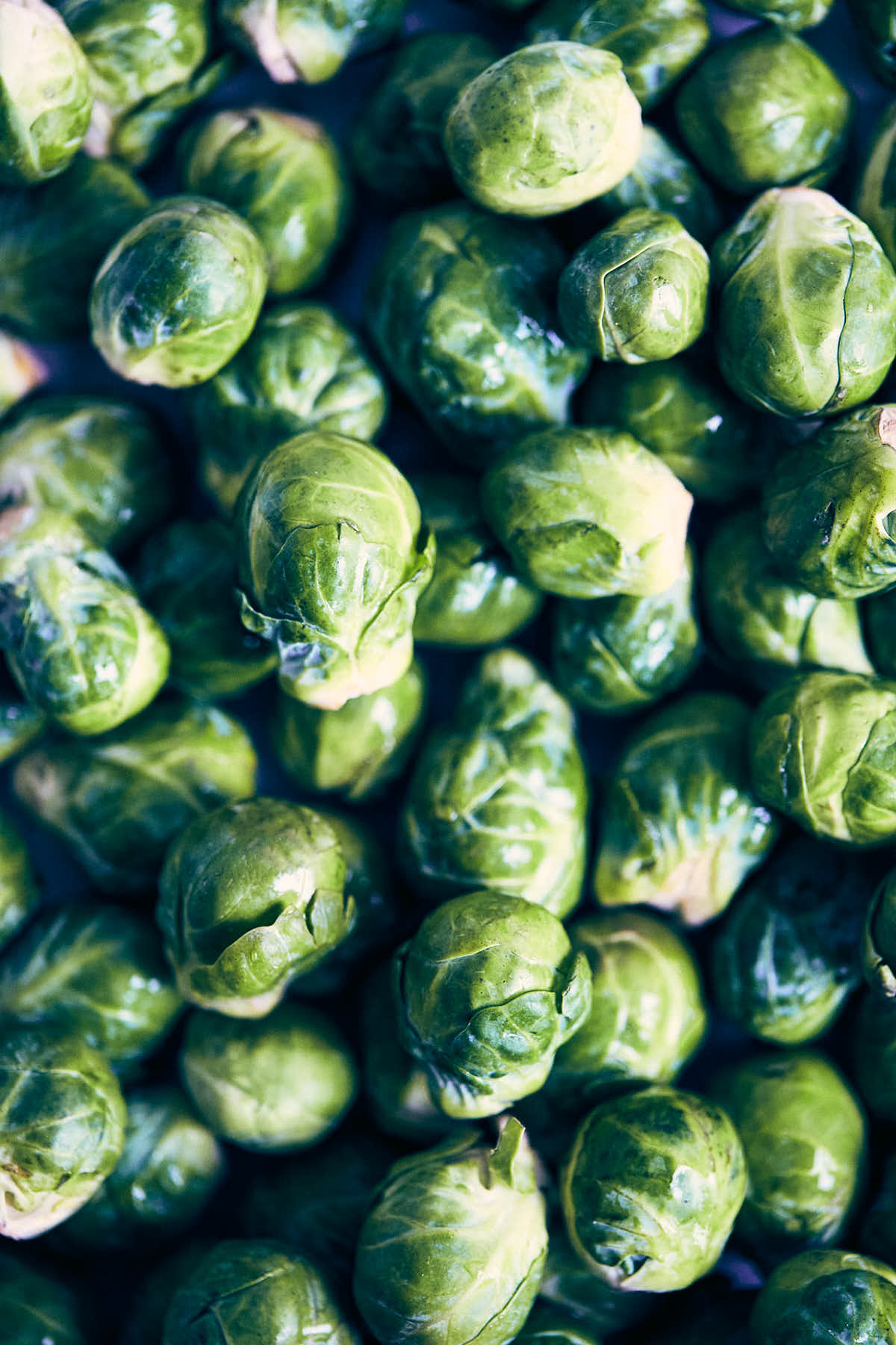 Brussels sprouts on a counter before being halved