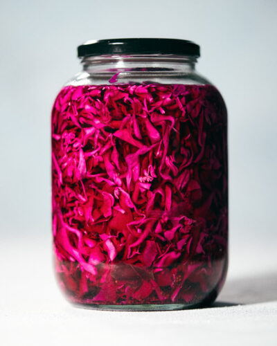 Pickled red cabbage in a jar on the counter