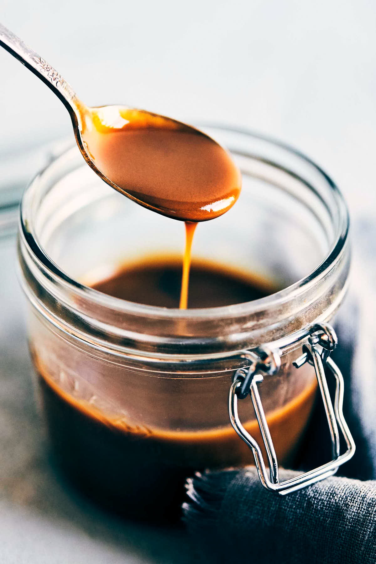 Salted caramel texture in a jar with a spoon