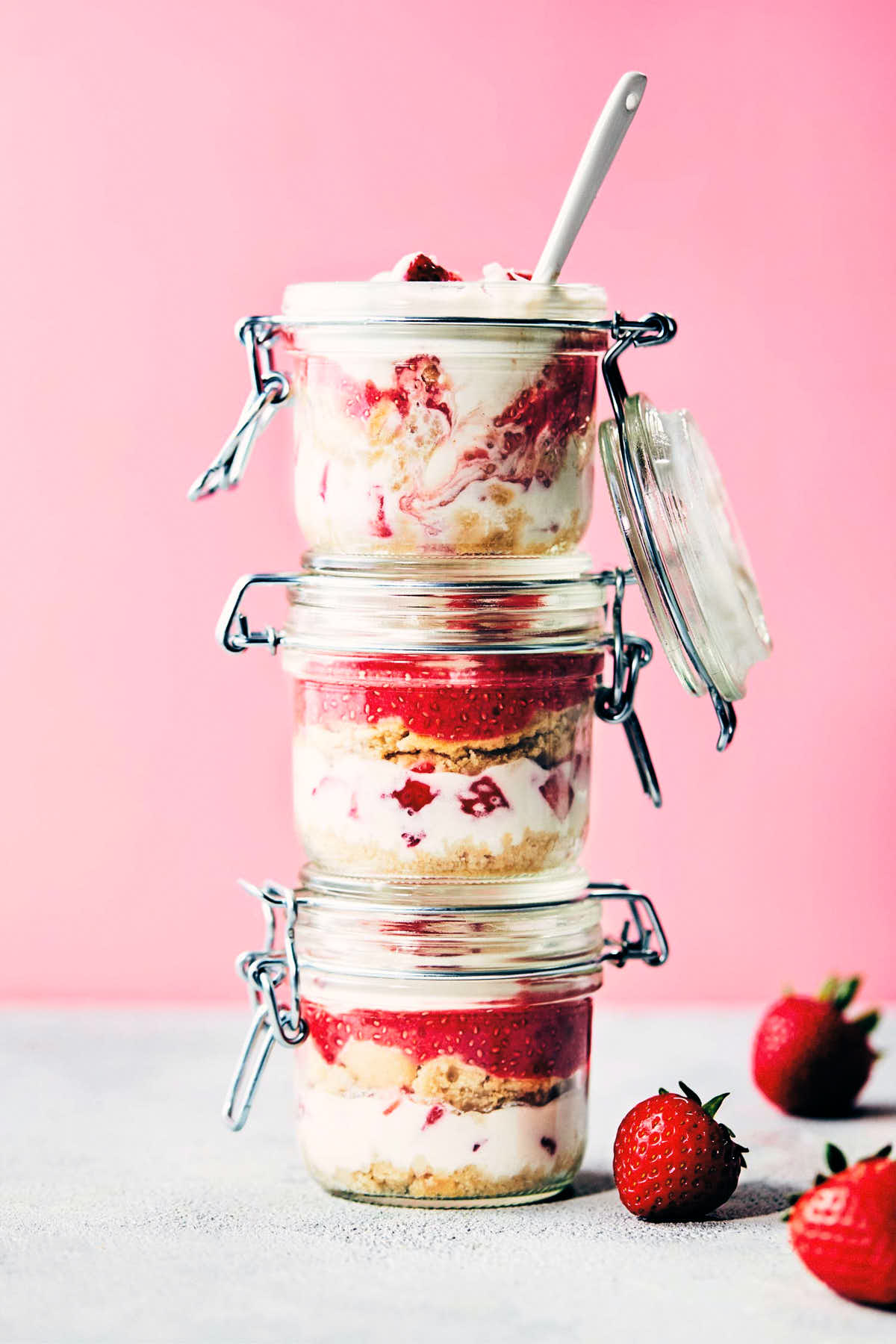 Stack of three strawberry shortcake trifle jars