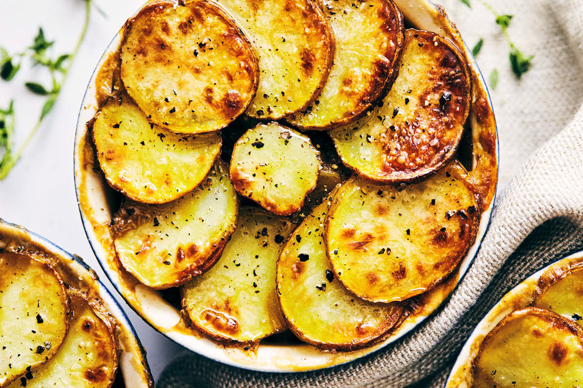 Close up of crispy potatoes on top of veggie pot pie