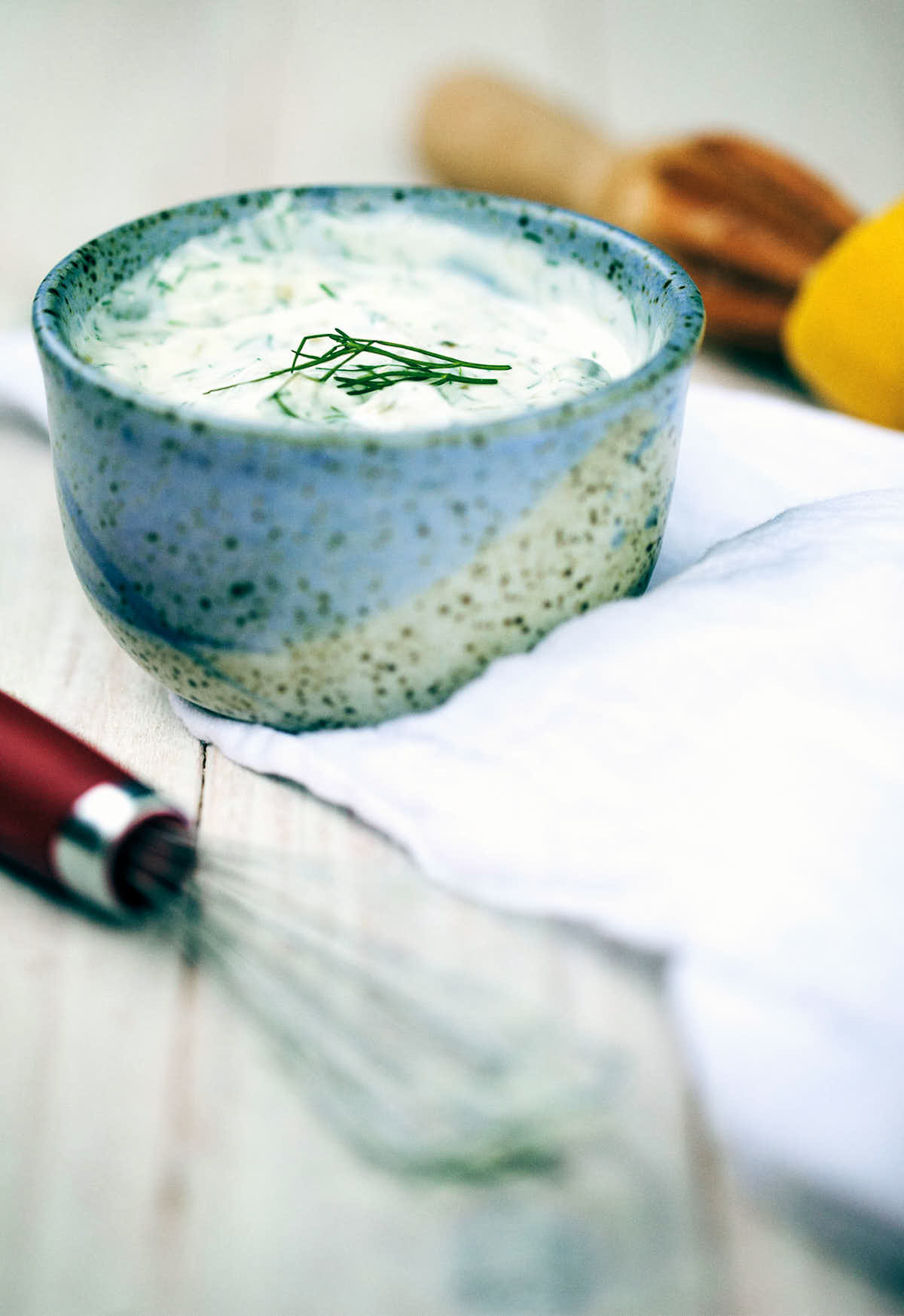 Yogurt and dill sauce topped with fresh dill