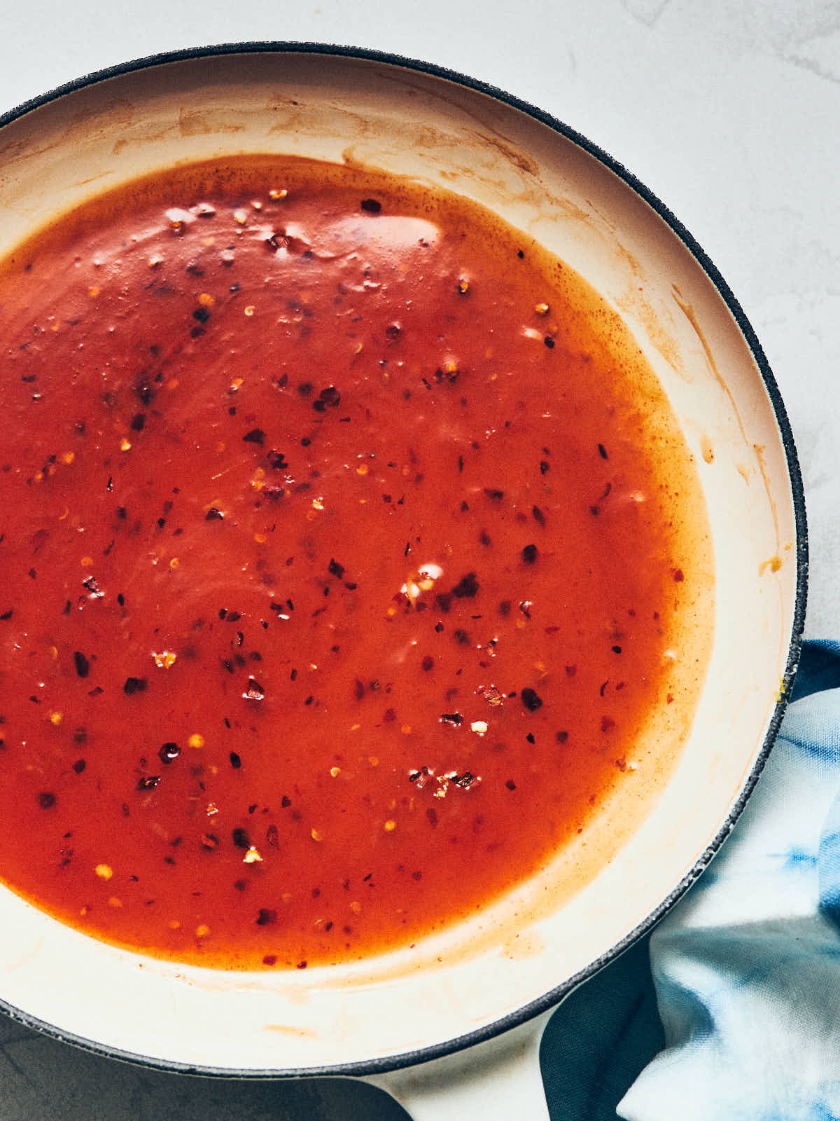 Sweet chili sauce in a white saucepan