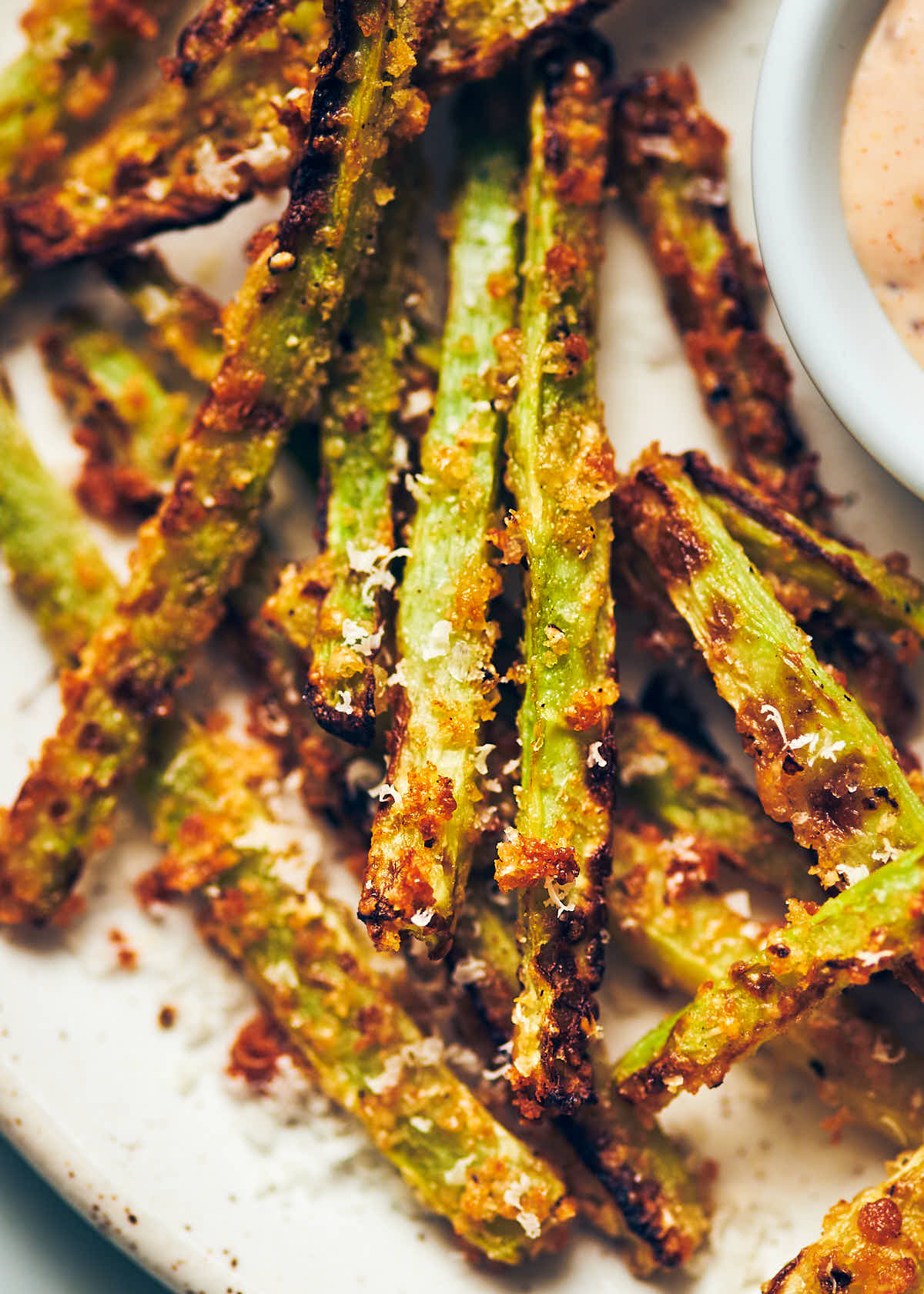 Close up photo showing texture of air fryer broccoli fries