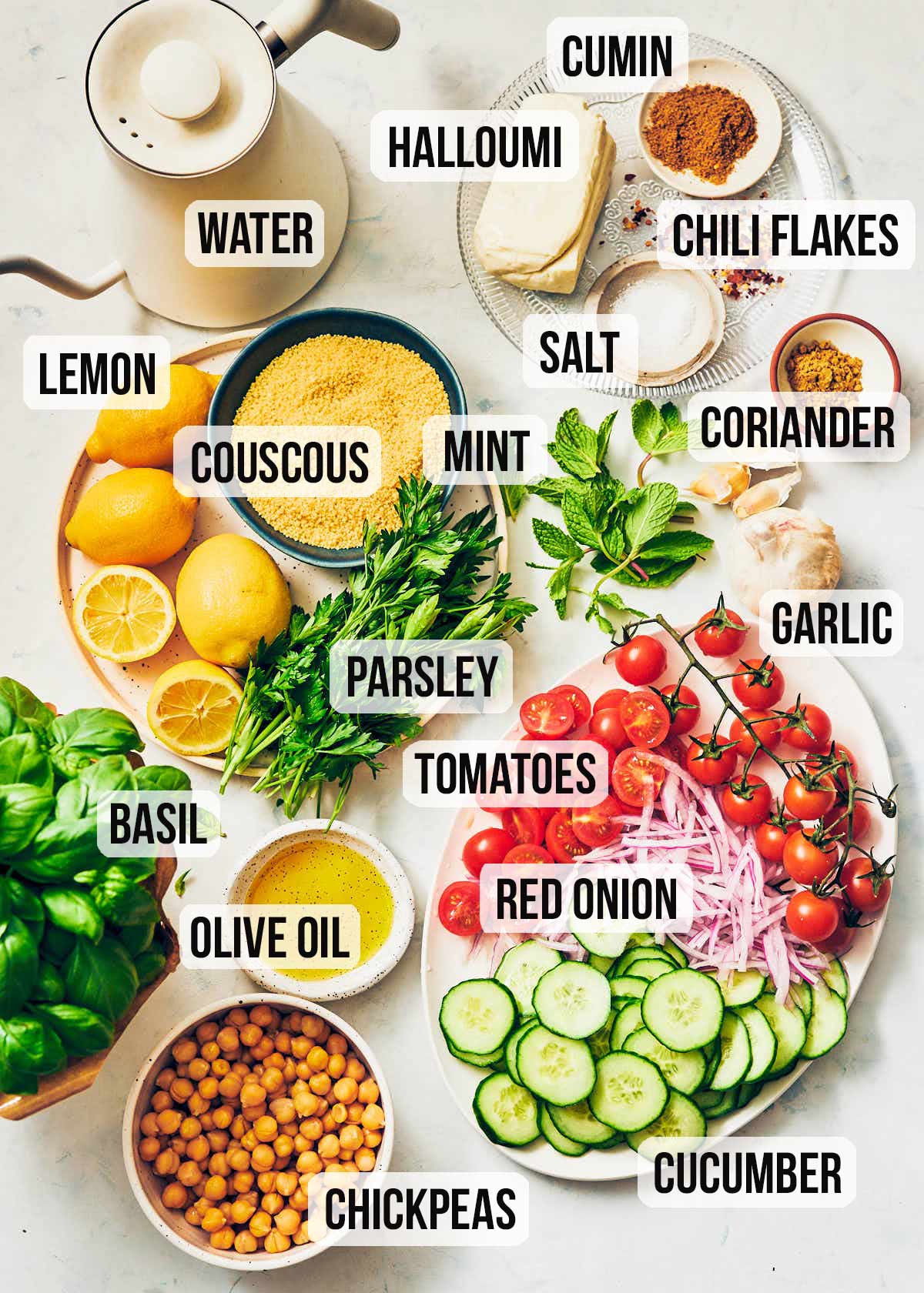 Ingredients to make Halloumi Couscous Salad with Lemon: couscous, fresh veggies, herbs, spices, chickpeas, lemon.