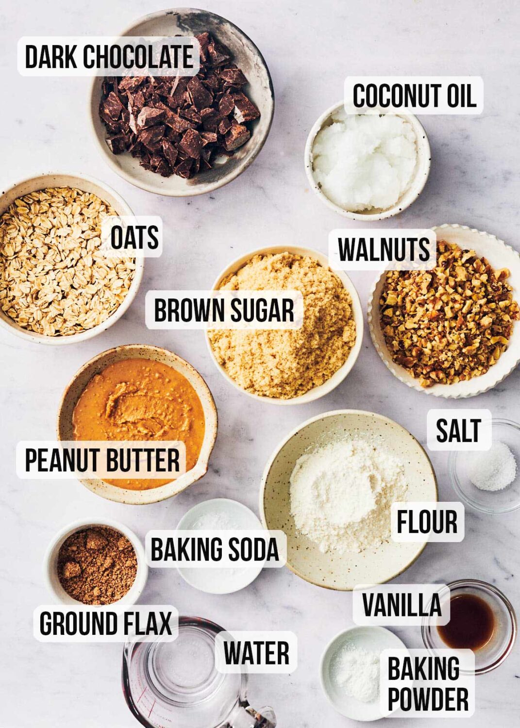 Ingredients to make Vegan Oat Chocolate Chip Cookies with Walnuts.