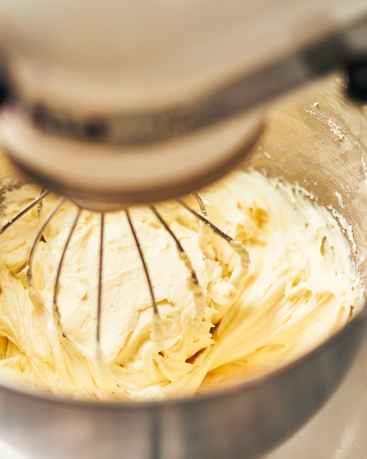 Making cream cheese icing in a stand mixer.