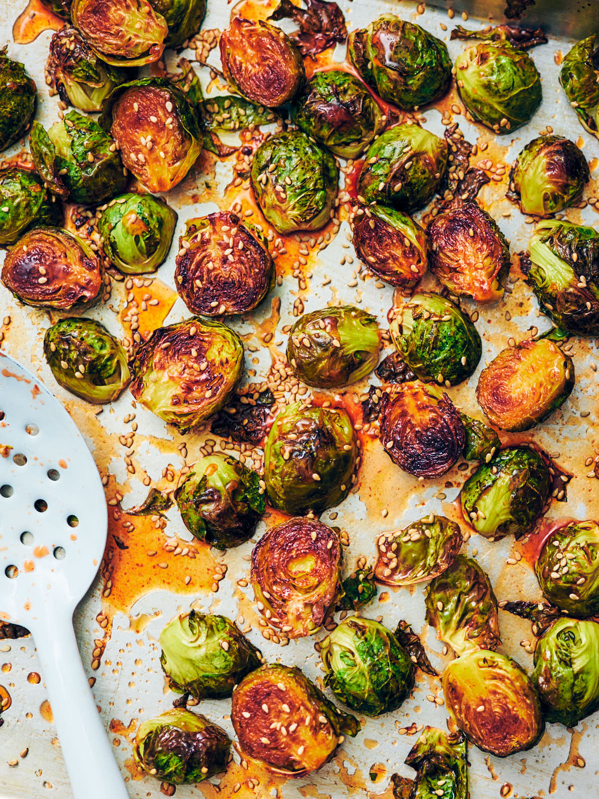 Roasted Maple Sriracha Brussels Sprouts on a baking sheet.