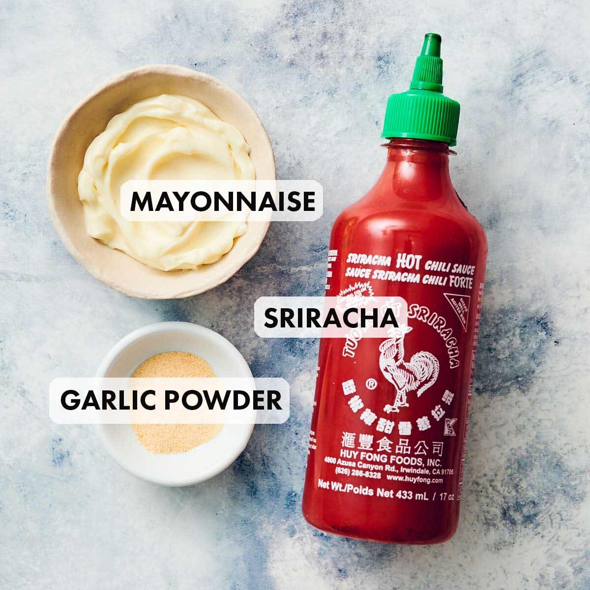 Ingredients to make easy Sriracha Aioli (Mayo, Garlic Powder, Sriracha).