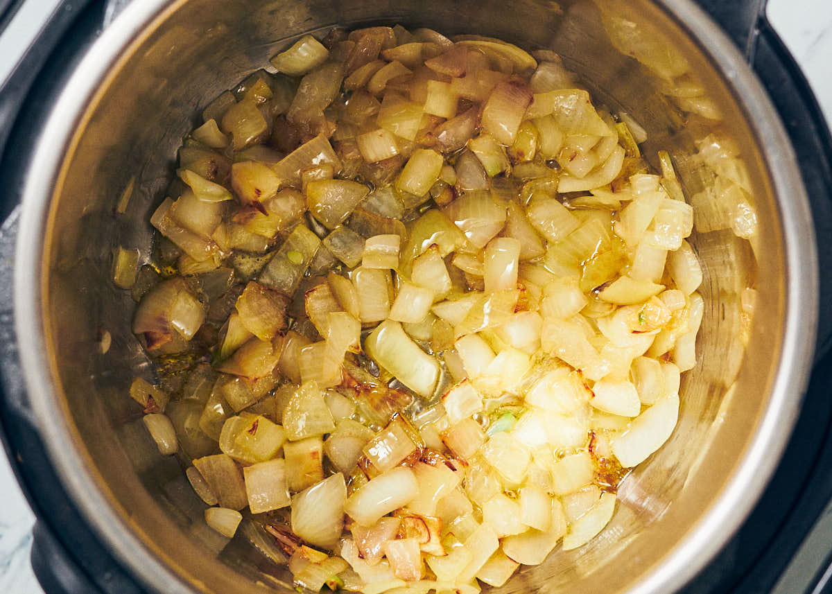 Onions sauteeing in an Instant pot for Bean Soup.