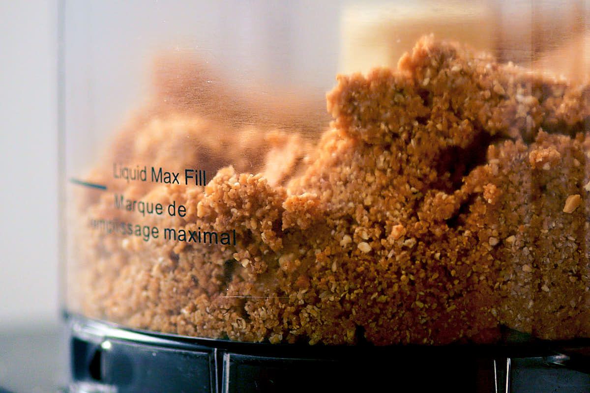 Coconut Peanut Butter Balls mixture in a food processor.
