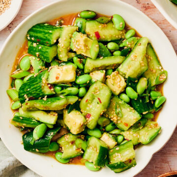 Easy Spicy Cucumber Salad with edamame and avocado in a serving bowl.