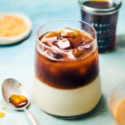 Iced coffee latte in a glass with brown sugar simple syrup.