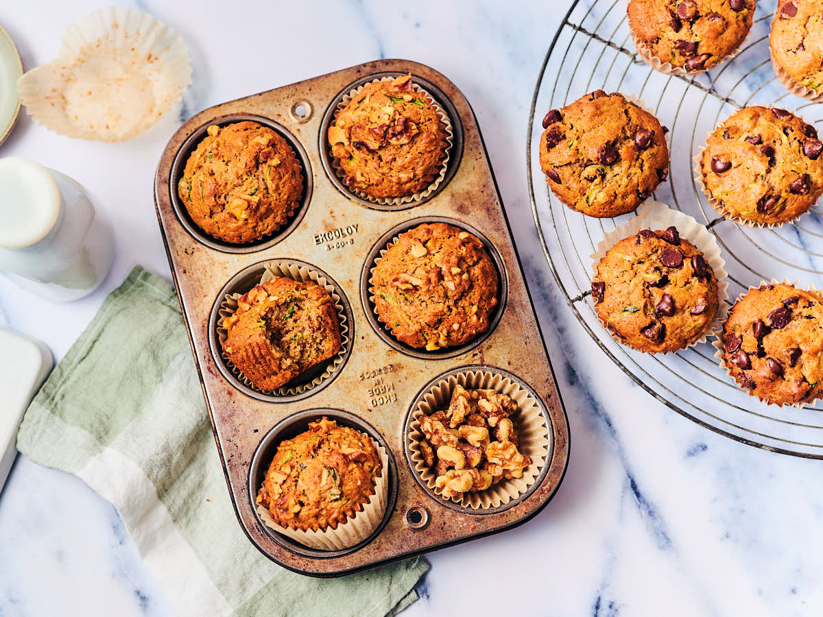 Easy Vegan Zucchini Muffins with walnuts and chocolate chips.