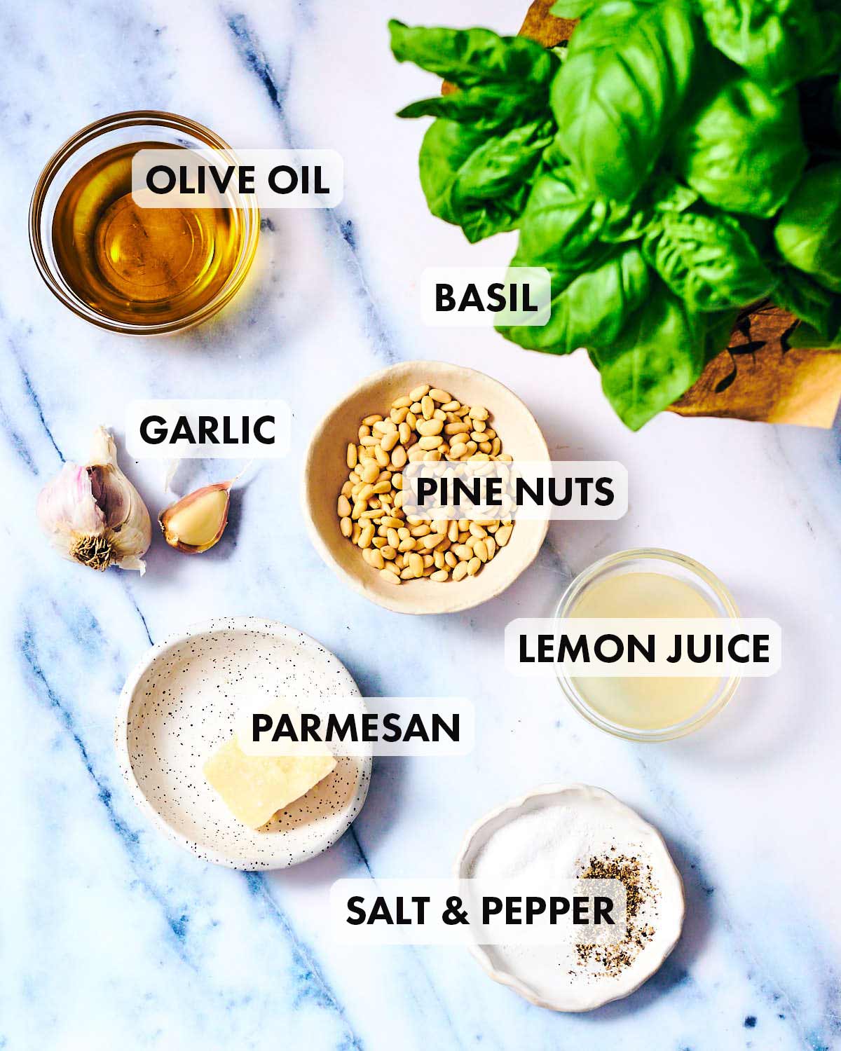 Ingredients to make the best homemade salad pesto dressing.