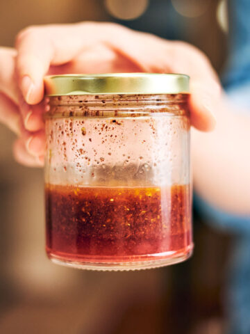Easy sumac dressing in a glass jar.