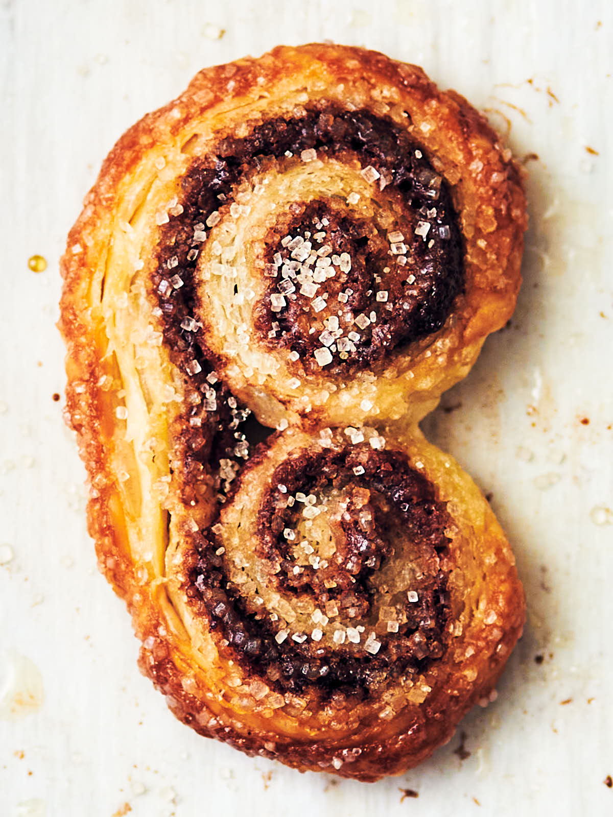 A flaky, golden-brown Nutella Puff Pastry Palmier.