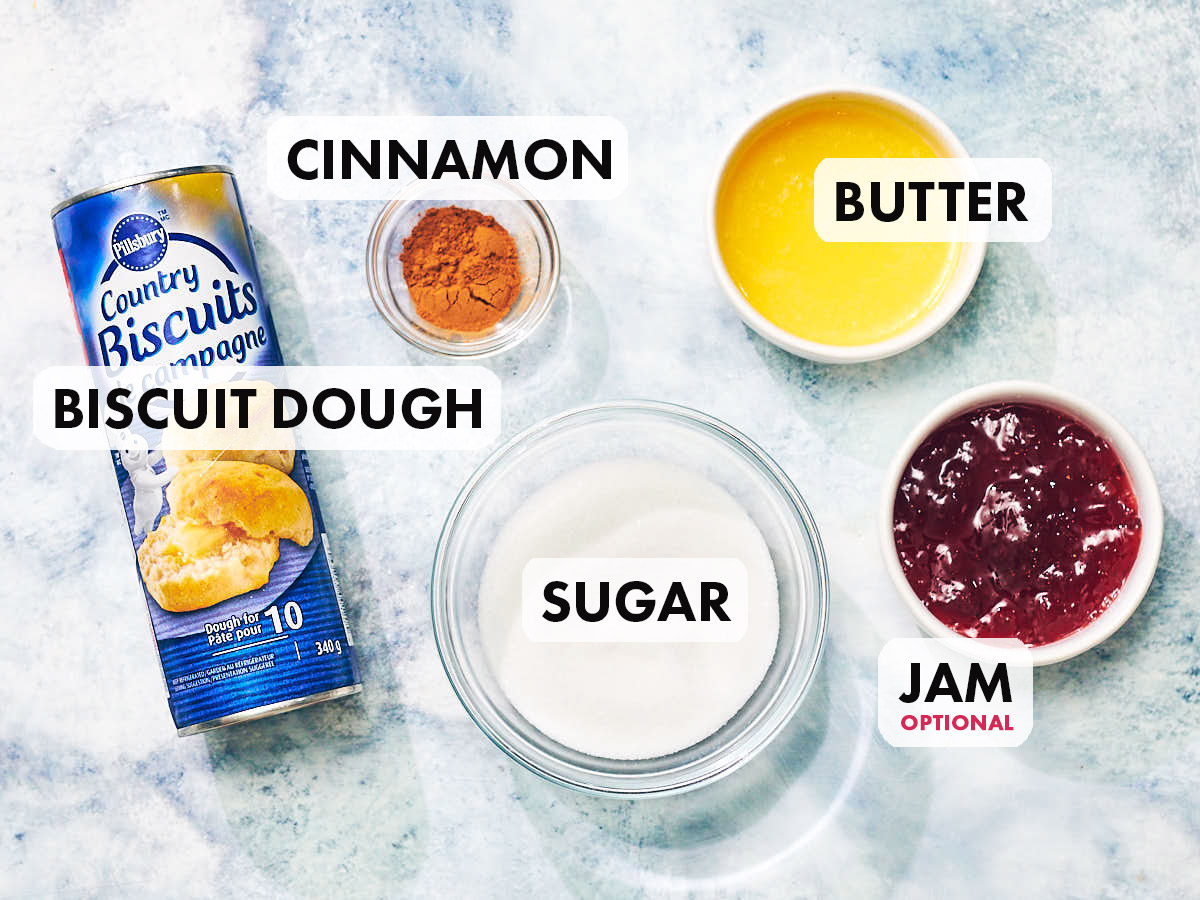 Ingredients to make cinnamon sugar air fryer donut holes with biscuit dough.