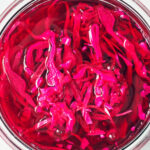 Quick pickled red cabbage in a glass jar.