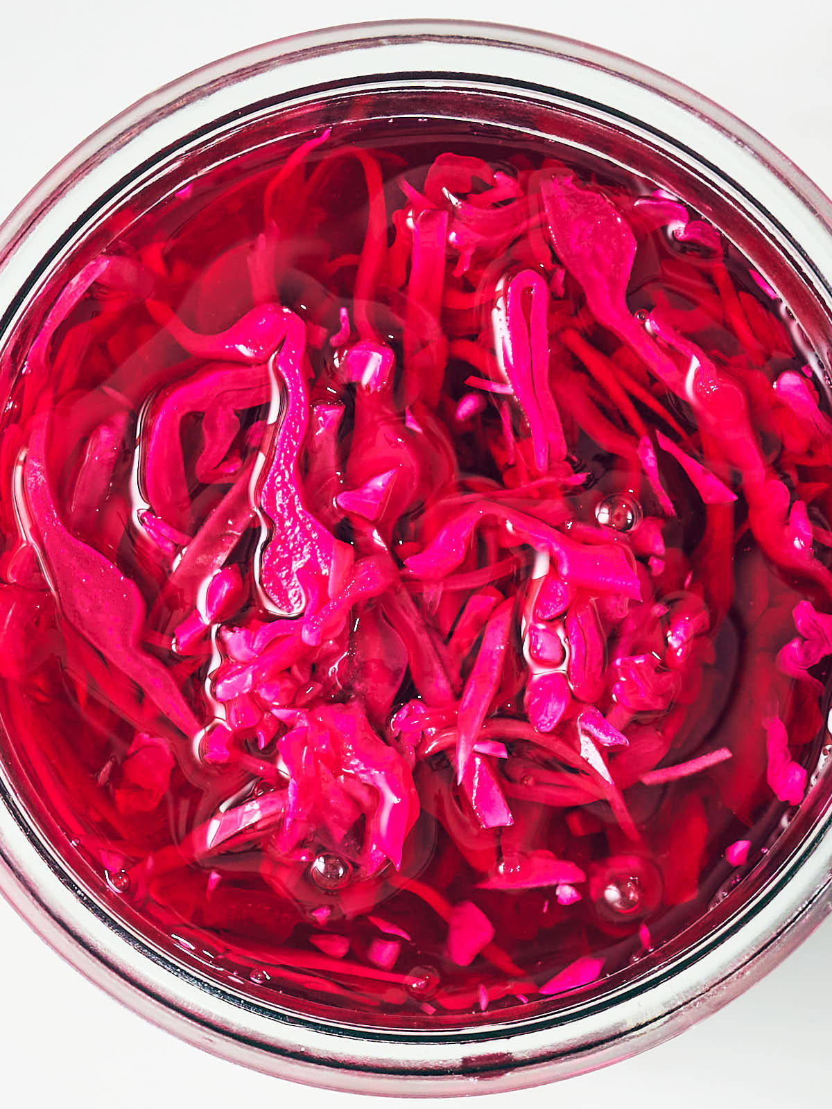 Quick pickled red cabbage in a glass jar.
