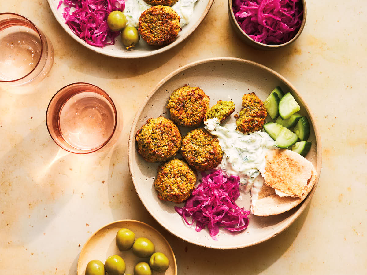 Falafel, quick pickled red cabbage, tzatziki, and pita from the Evergreen Kitchen cookbook.