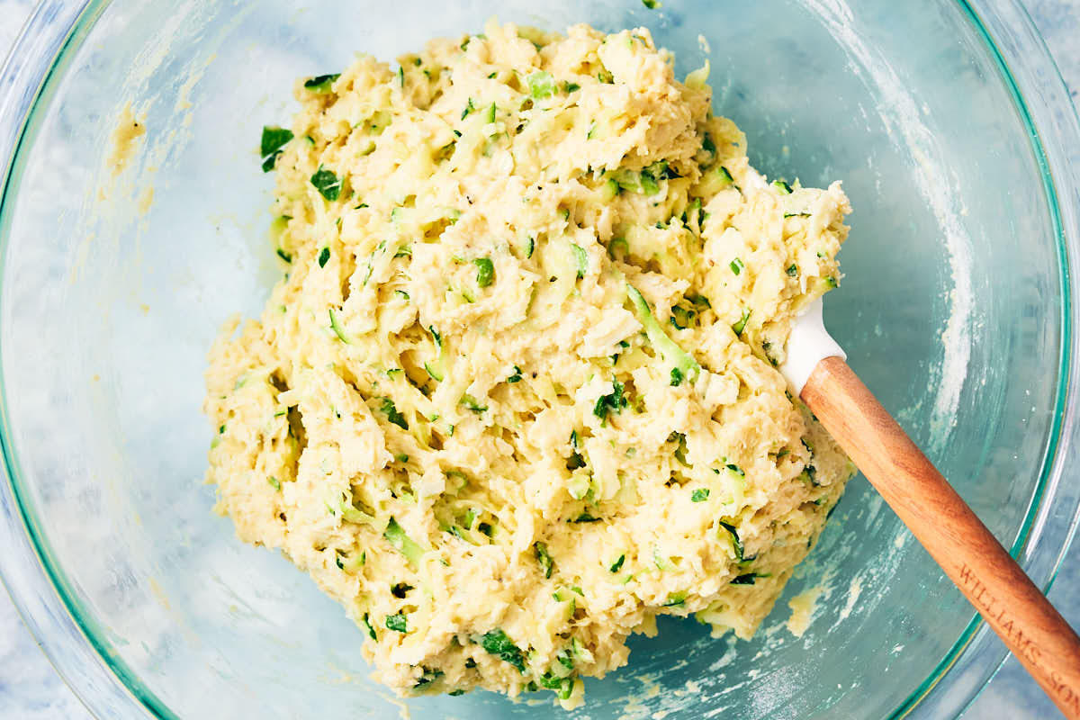 Savory zucchini muffin batter in a bowl before baking.