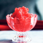Strawberry Rhubarb Granita in a glass serving bowl.