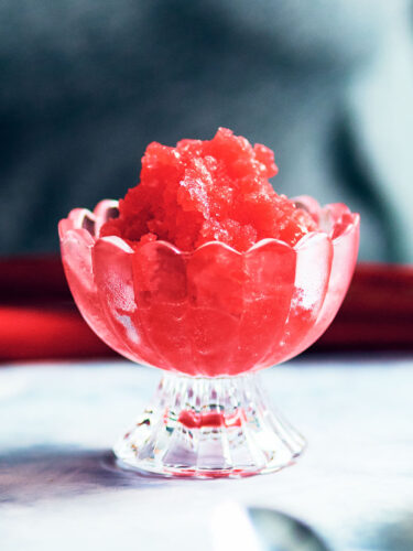 Strawberry Rhubarb Granita in a glass serving bowl.