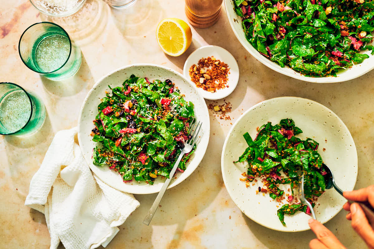 Healthy Swiss Chard Salad being served at a dinner table.