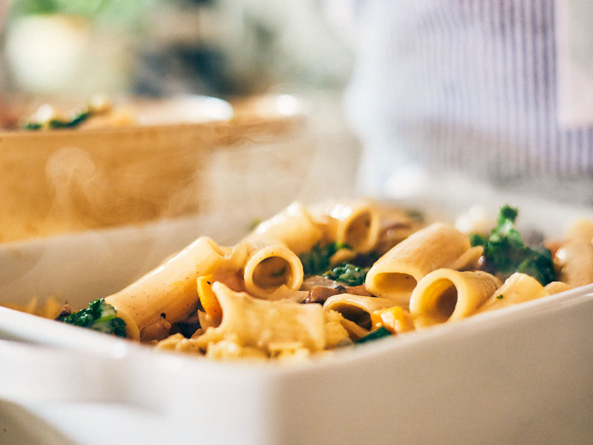 Butternut squash pasta in a casserole dish before adding cheese.