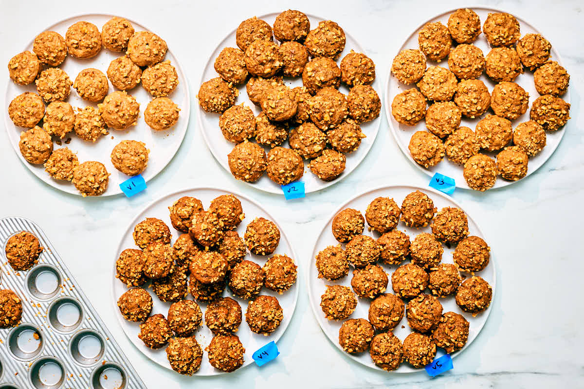 Different versions of Banana Nut Bread Mini Muffins on plates during recipe development phase.