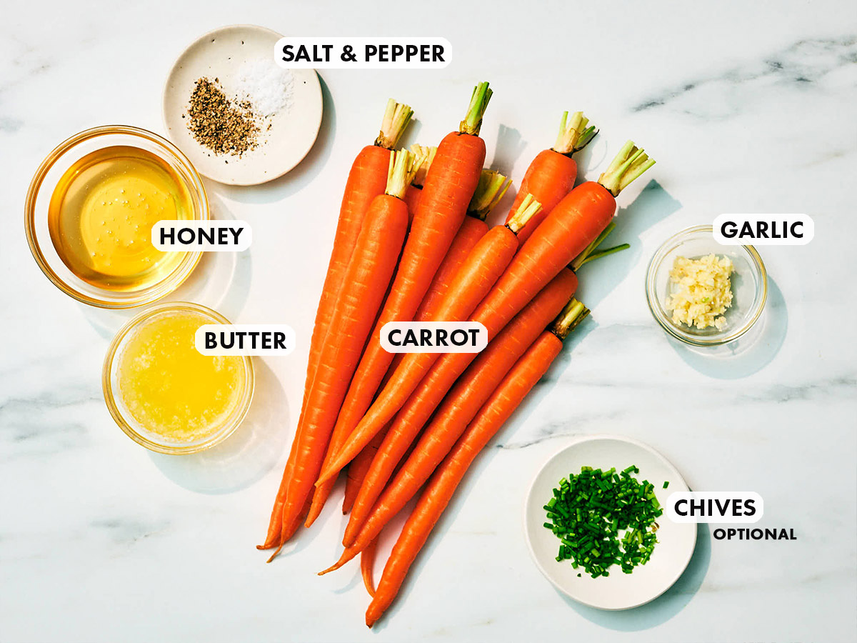 Ingredients to make Air Fryer Honey Roasted Carrots with butter and garlic.