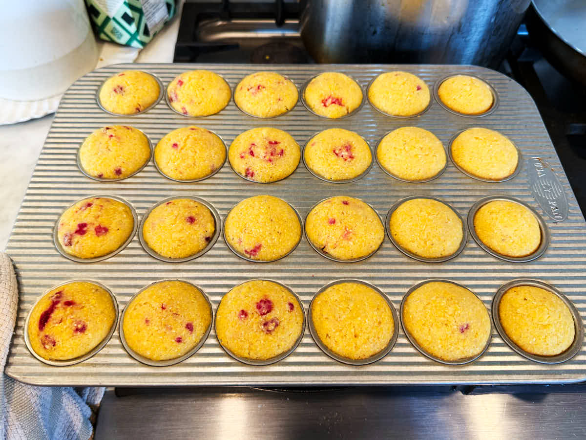 Evergreen Kitchen's Mini Cornbread Muffin recipe made with raspberries.