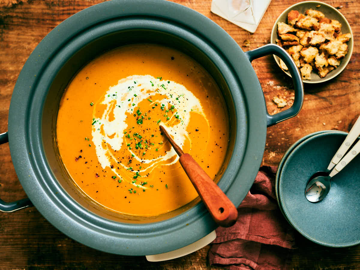 Easy Pumpkin Soup with canned pumpkin and butternut squash in a slow cooker.