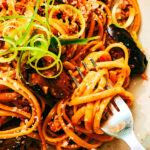 Evergreen Kitchen's Gochujang Pasta with eggplant twirled on a fork.