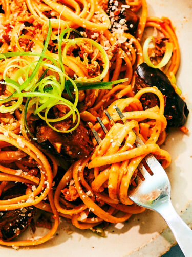 Evergreen Kitchen's Gochujang Pasta with eggplant twirled on a fork.