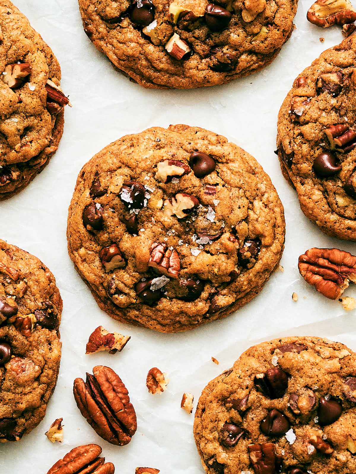 Chocolate Chip Pecan Cookies on parchment paper.