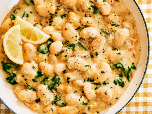 High Protein Creamy Lemon Butter Beans with Cottage Cheese in skillet.