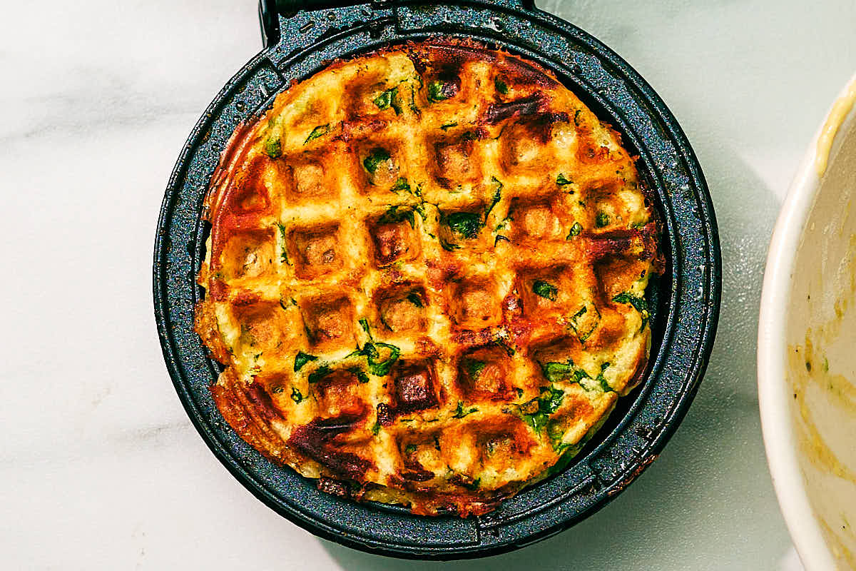 Savory High Protein Waffle with cottage cheese in a waffle maker.