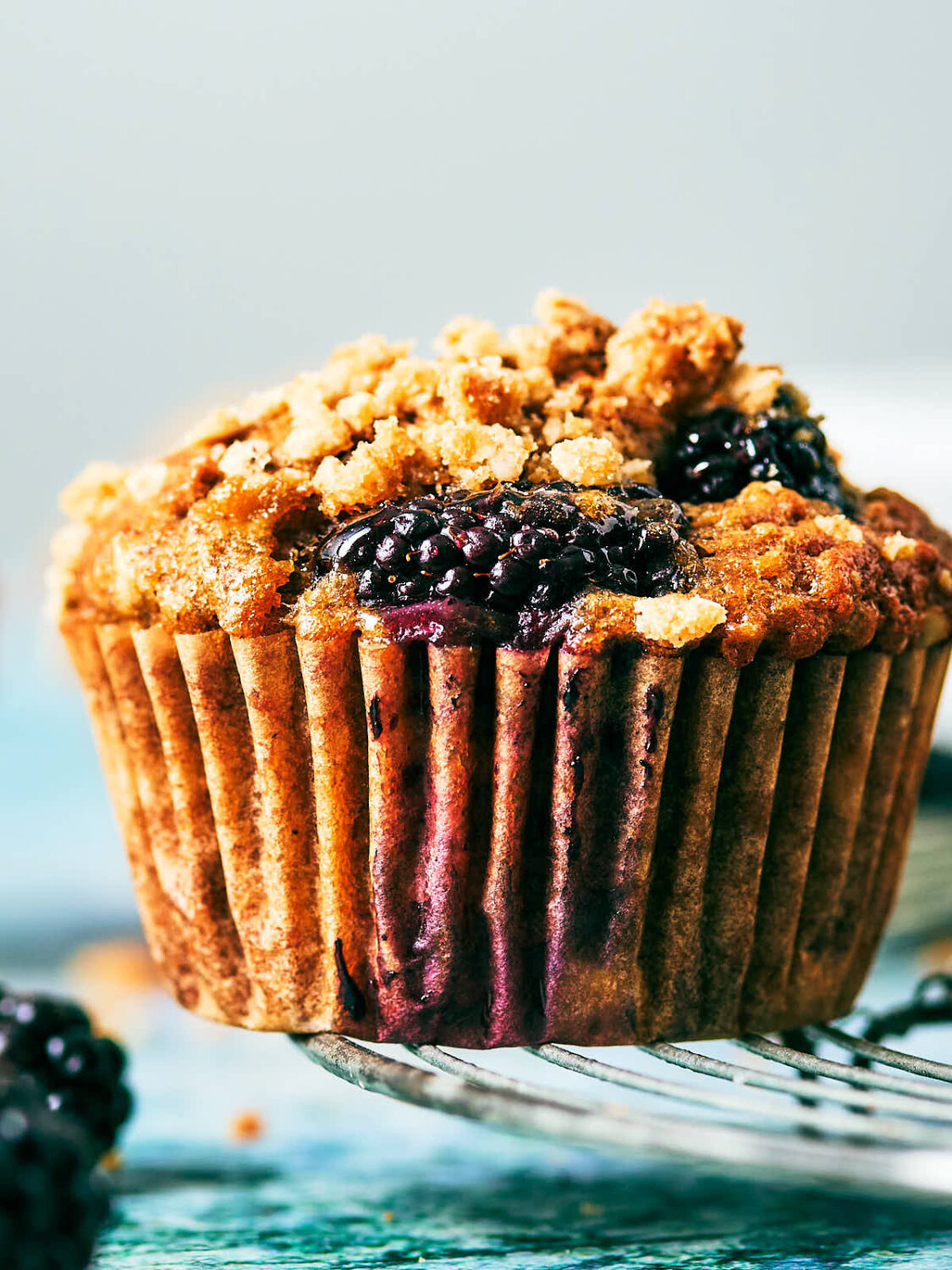 Bakery style Banana Blackberry Muffins with oat streusel.