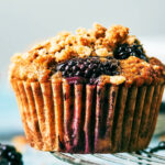 Bakery style Banana Blackberry Muffins with oat streusel.