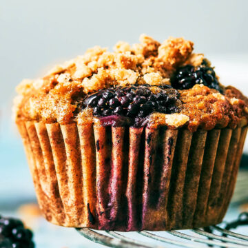 Bakery style Banana Blackberry Muffins with oat streusel.