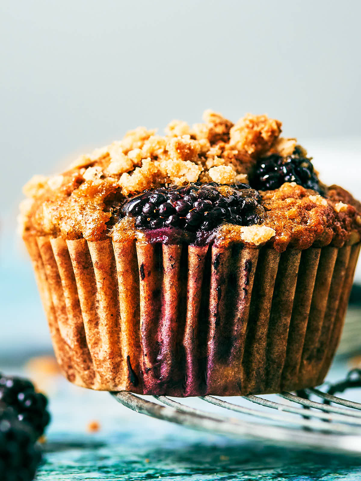 Bakery style Banana Blackberry Muffins with oat streusel.