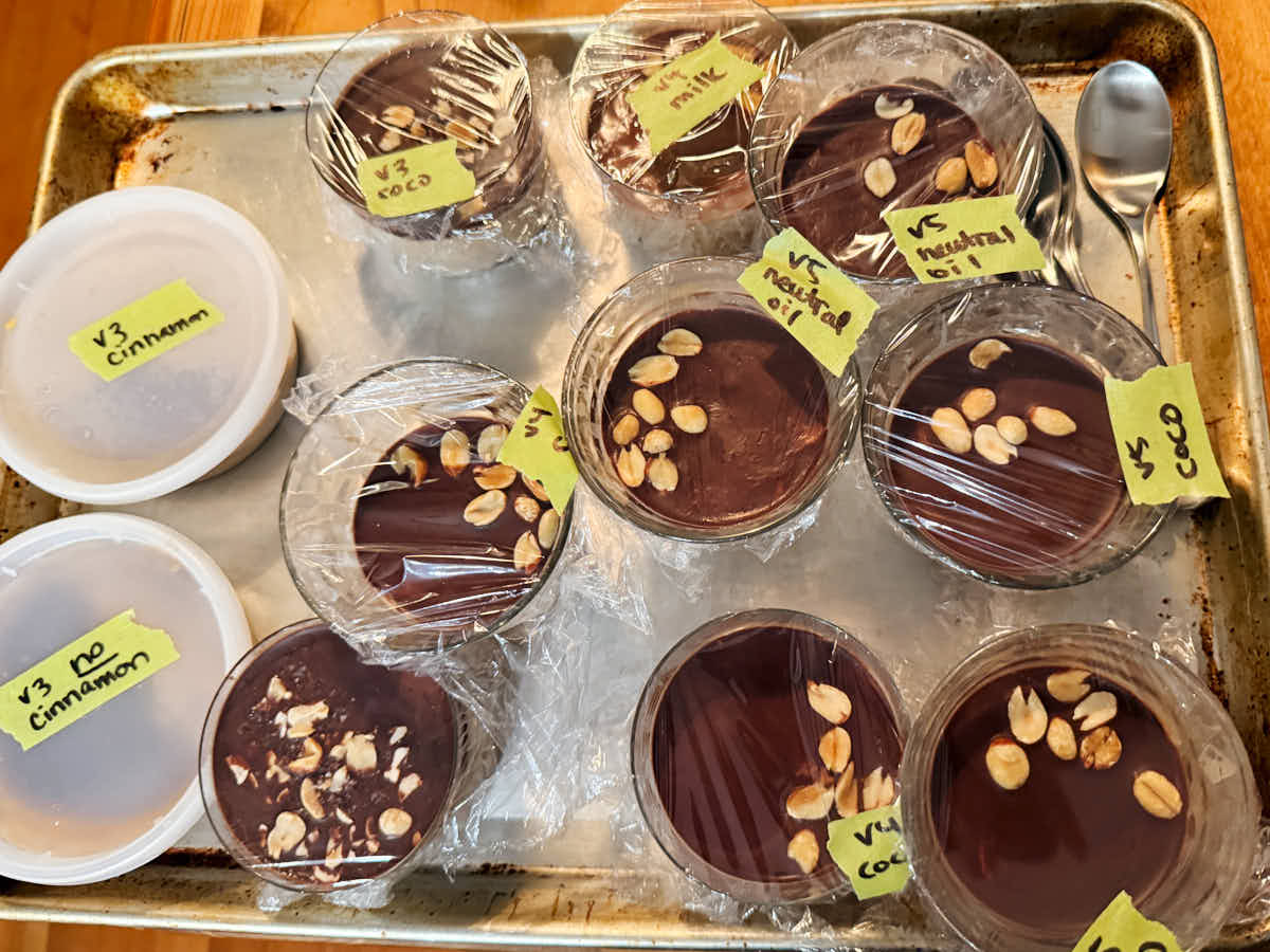 Various different recipe tests for peanut butter chia pudding in the Evergreen Kitchen.