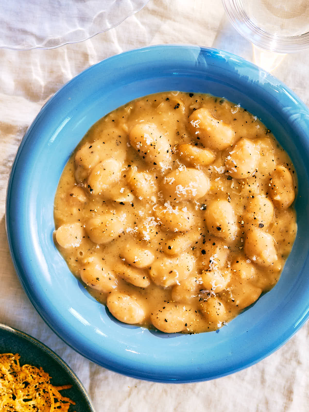 Evergreen Kitchen's Cacio e Pepe Beans with cheese crisps.