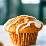 Pumpkin Protein Muffin with cottage cheese drizzled with cream cheese icing.